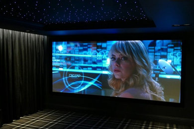 This is an example of a farmhouse home cinema in Berkshire.