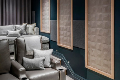 Inspiration for a medium sized modern enclosed home cinema in Other with carpet and a projector screen.