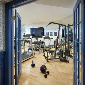 Blue French Doors Lead to Home Gym