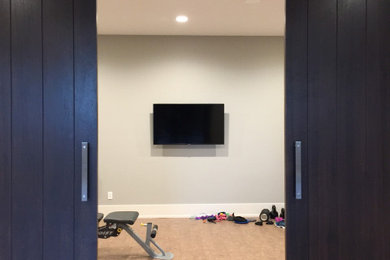 Small minimalist cork floor and beige floor multiuse home gym photo in Edmonton with gray walls