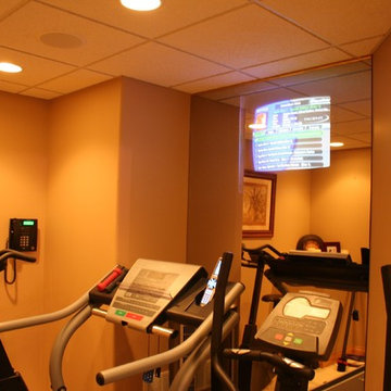 Fitness Room - TV Screen Behind Mirror