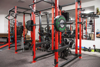 Photo of a contemporary home gym in Phoenix.