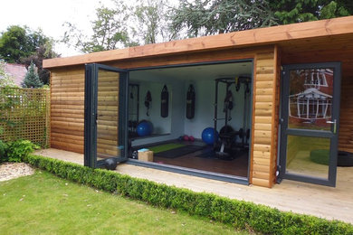 Photo of a contemporary home gym in Manchester.