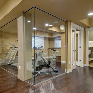 Mid-sized transitional multipurpose gym in Denver with beige walls, dark hardwood floors and brown floor.