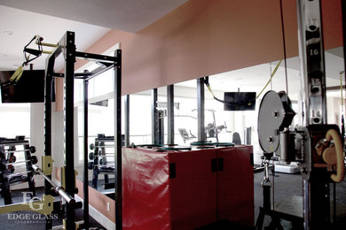 Inspiration for a modern home gym remodel in Calgary