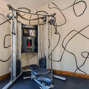 Foto di una palestra multiuso minimal di medie dimensioni con pareti grigie