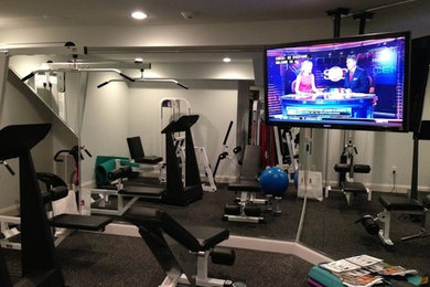 Example of a trendy home gym design in New York