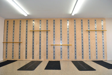 Example of a mid-sized eclectic home gym design in Cleveland