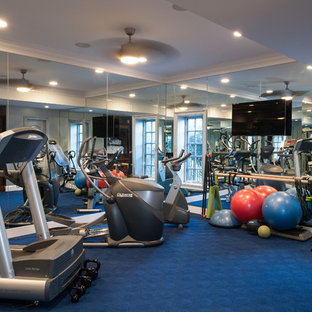 Idee per una palestra in casa chic con pavimento blu
