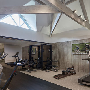 Inspiration for a medium sized contemporary multi-use home gym in Cheshire with beige walls, dark hardwood flooring and black floors.