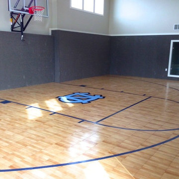 SnapSports® - Cox family indoor home basketball court with patent TuffShield®