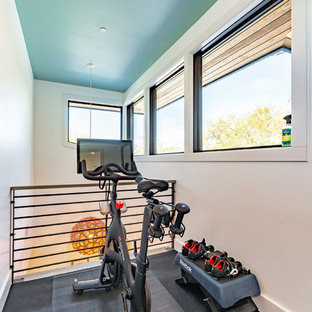 Inspiration for a large contemporary gray floor home gym remodel in Austin with white walls
