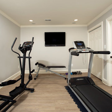 Updated Traditional Basement with Home Gym and Wine Cellar