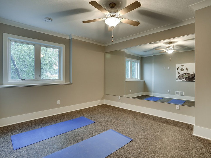 Large transitional cork floor idea for a home yoga studio with gray walls