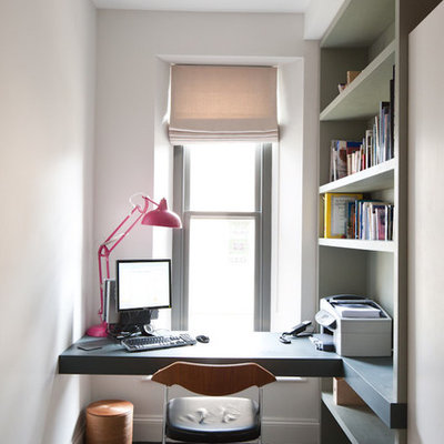 Example of a trendy built-in desk home office design in Other