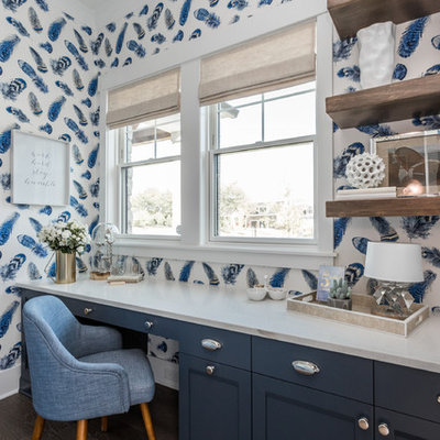 Study room - transitional built-in desk study room idea in Indianapolis with multicolored walls