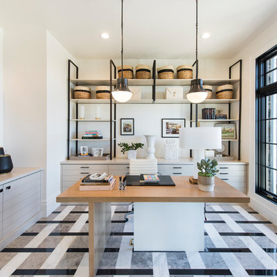 Example of a large transitional freestanding desk carpeted and multicolored floor home office design in Salt Lake City with white walls and no fireplace