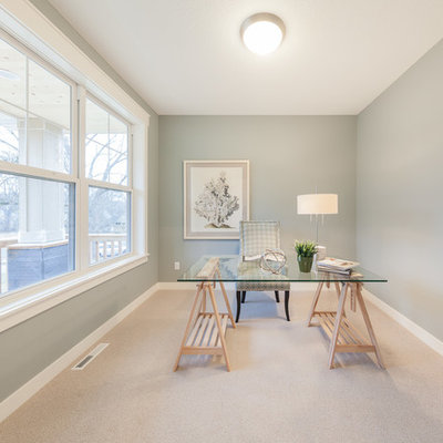 Inspiration for a mid-sized farmhouse freestanding desk carpeted and beige floor study room remodel in Minneapolis with green walls