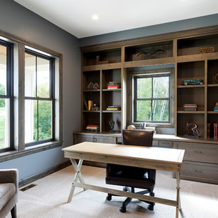 Inspiration for a timeless freestanding desk carpeted study room remodel in Minneapolis with blue walls