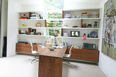 Example of a trendy home office design in Portland