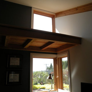 Inspiration for a mid-sized timeless built-in desk study room remodel in Seattle with white walls