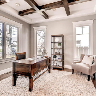 Home office - mid-sized transitional freestanding desk dark wood floor home office idea in Denver with gray walls and no fireplace
