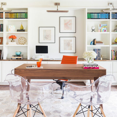 Example of a trendy freestanding desk study room design in Nashville with white walls