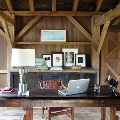 Inspiration for a mid-sized farmhouse freestanding desk light wood floor home office remodel in New York with brown walls