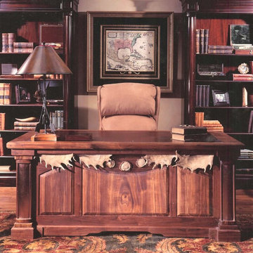A hand crafted desk inc copper clad columns, fallow horns & a leather top