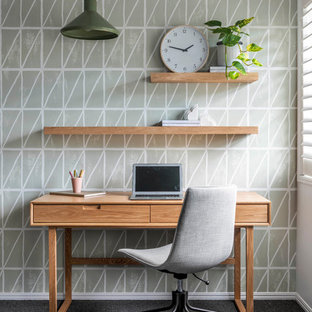 Inspiration for a contemporary study room in Brisbane with white walls, carpet, no fireplace, a freestanding desk and grey floor.