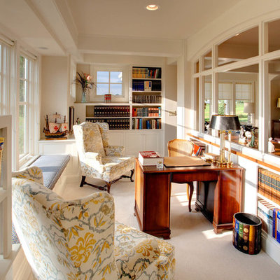 Study room - mid-sized traditional freestanding desk carpeted study room idea in Milwaukee with beige walls