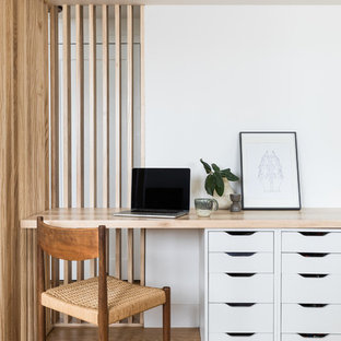 Mid-century modern home office photo in Denver