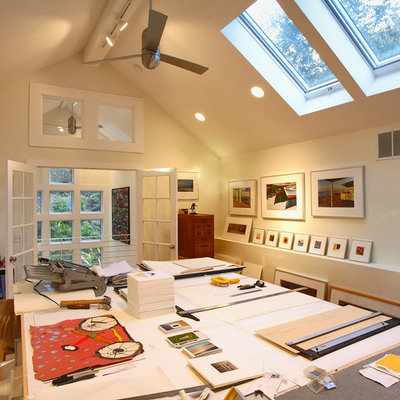 Large trendy medium tone wood floor home studio photo in Bridgeport with white walls and no fireplace