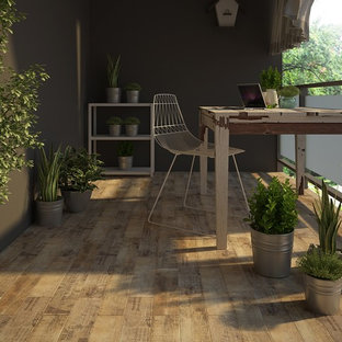 Idées déco pour un bureau contemporain avec un sol en carrelage de porcelaine.