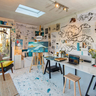 Inspiration for a contemporary freestanding desk craft room remodel in Other