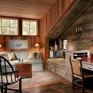 Study room - large traditional built-in desk medium tone wood floor study room idea in Philadelphia with no fireplace