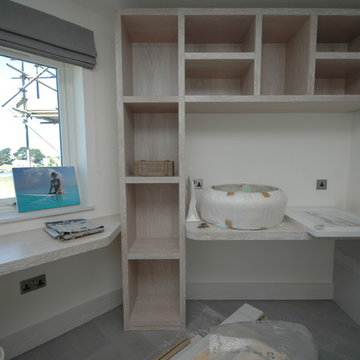 Beach side residence. Bespoke rustic white washed fitted furniture