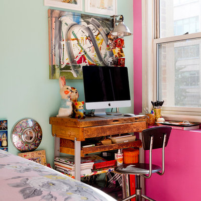 Inspiration for a small eclectic freestanding desk medium tone wood floor home office remodel in New York with multicolored walls