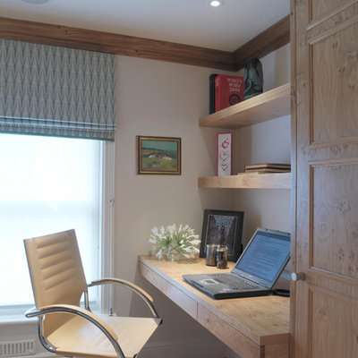 Inspiration for a cottage built-in desk home office remodel in London