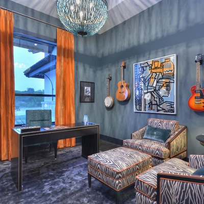 Inspiration for a transitional freestanding desk home office remodel in Austin with blue walls and no fireplace