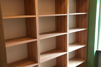 Bookcases.  Reclaimed floorboards (Hannah Suzinka review)