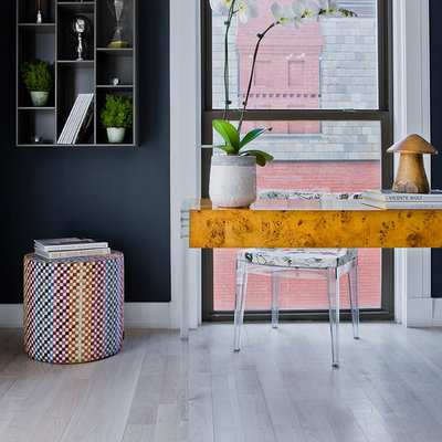 Study room - mid-sized contemporary freestanding desk light wood floor and beige floor study room idea in Boston with blue walls and no fireplace