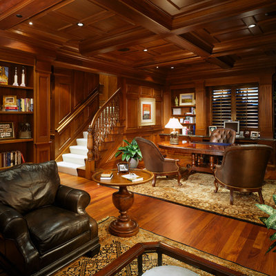 Inspiration for a huge timeless freestanding desk dark wood floor home office remodel in Denver