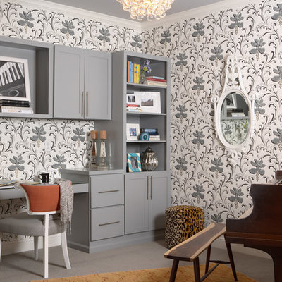 Inspiration for a transitional built-in desk carpeted home office remodel in Minneapolis with multicolored walls