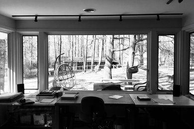 This is an example of a midcentury home office in Richmond.