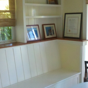 Built in bench seat with bookcase above