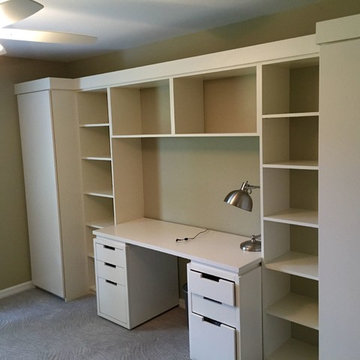 Built in wardrobe and shelves built around an existing desk