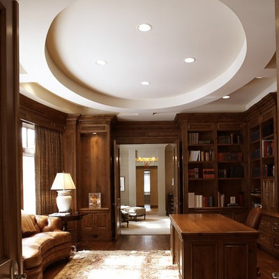 Example of a classic freestanding desk dark wood floor home office design in Minneapolis