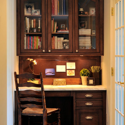 Example of a small classic built-in desk study room design in New York