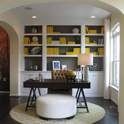 Inspiration for a mid-sized transitional freestanding desk dark wood floor home office remodel in DC Metro with gray walls